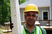 foto of construction worker  - Male Hispanic construction worker on the job - JPG 