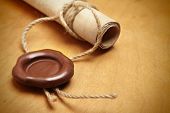 foto of credence  - Scroll with wax seal on a wooden table - JPG 
