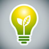 stock photo of future  - Bulb light with young shoots inside on grey background - JPG 