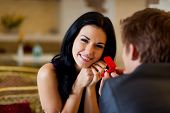 stock photo of meeting  - marriage proposal, man give ring to his girl, young happy couple romantic date at restaurant, celebrating valentine day
** Note: Shallow depth of field - JPG 