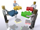 foto of workforce  - A team collaborating to build a puzzle - JPG 