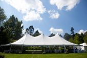 image of outdoor  - A large white wedding tent set up for an outdoor function or banquet - JPG 