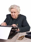 foto of computer technology  - Old lady working an old - JPG 