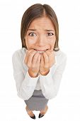 picture of bites  - Frightened and stressed young business woman biting her fingers - JPG 