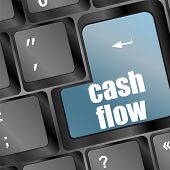foto of investment  - cash flow investment concept with a button on computer keyboard - JPG 
