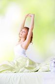 image of wake  - young girl waking up in the morning - JPG 