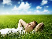 image of man  - young man in spring grass - JPG 