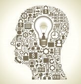pic of business concept  - the silhouette of a human head with a lamp and small business icons - JPG 