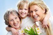 stock photo of hug  - Portrait of happy girl hugging mature lady and woman - JPG 