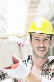 pic of construction worker  - handsome hard worker people portrait at concstruction site - JPG 