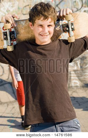 group of young teen boys together with skateboard on playground | Stock ... group of young teen boys together with skateboard on playground | Stock ...