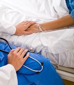 pic of md  - doctor comforting patient - JPG 