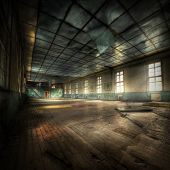 image of interior  - abandoned gym with cyrellic letters on the walls hdr processing - JPG 