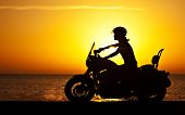 pic of lifestyles  - Woman biker over sunset - JPG 