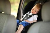 foto of seating  - Boy sleeping in child car seat - JPG 