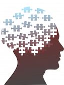 picture of puzzle  - Jigsaw puzzle pieces as the mind in the profile head of the profile of a man - JPG 