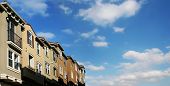 image of blue sky  - modern houses and sky with clouds - JPG 