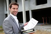 stock photo of construction  - Construction salesman checking building site - JPG 