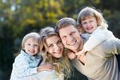 pic of outdoor  - Smiling family with children outdoors - JPG 