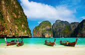 picture of beach  - Tropical beach traditional long tail boats famous Maya Bay Thailand - JPG 