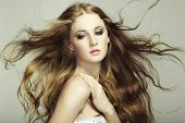 foto of grace  - Portrait Of Young Beautiful Woman With Long Flowing Hair - JPG 