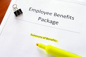 image of employee  - an employee benefits document with highlighted text - JPG 