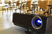 stock photo of seating  - Digital projector in a conference hall - JPG 