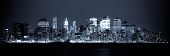 stock photo of bridge  - New York - Panoramic view of Manhattan Skyline by night
** Note: Slight graininess, best at smaller sizes - JPG 