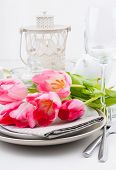 image of setting  - Festive spring table setting with pink tulips napkins in bright colors - JPG 