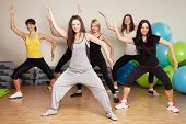 foto of fitness  - Group training in a gym of a fitness center - JPG 