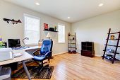 stock photo of interior  - Home office interior with hardwood floor and simple furniture - JPG 