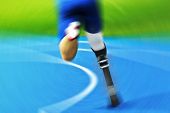 picture of competition  - athlete with carbon prosthesis on race track - JPG 