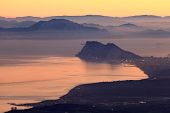 stock photo of sunset  - The Rock of Gibraltar and African Coast at sunset - JPG 