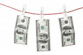 picture of money  - One hundred bills with clothespins on a white background - JPG 