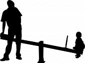 stock photo of seesaw  - father and boy playing - JPG 