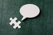 pic of puzzle  - final piece of puzzle and speech bubble - JPG 