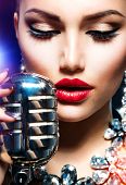 foto of retro  - Singing Woman with Retro Microphone - JPG 