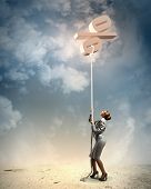 pic of percentage  - Image of businesswoman climbing the rope attached to percentage sign - JPG 