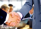 foto of handshake  - handshake isolated on business background - JPG 