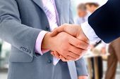 image of handshake  - handshake isolated on business background - JPG 