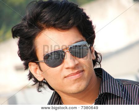 indian man wearing black glasses indian man wearing black glasses