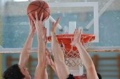 foto of competition  - competition cencept with people who playing basketball in school gym - JPG 