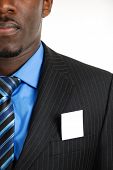 stock photo of embed  - This is an image of a business man with a card inside the suit pocket - JPG 