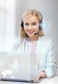 picture of helpline  - futuristic female helpline operator with headphones and virtual screen - JPG 