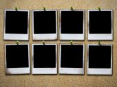 image of  photo  - eight photo frames on grunge wall - JPG 