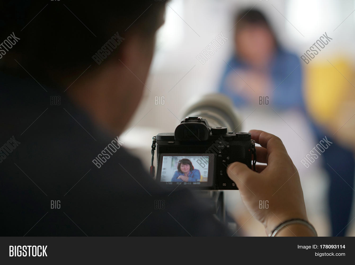 Photographer behind camera taking picture of model Stock Photo & Stock Images Bigstock