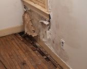 image of leak  - a water damaged interior wall in an old house - JPG 