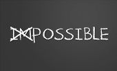 stock photo of possibility  - Changing impossible into possible on a chalkboard - JPG 
