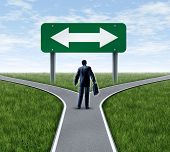 stock photo of dilemma  - Decision time for a career with a business man at a cross roads and road sign with arrows showing a fork in the road representing the concept of a work dilemma choosing the direction to go when facing two equal or similar job options - JPG 