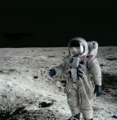 image of pressure  - figure of american astronaut wearing an apollo type pressure suit against a moon background - JPG 